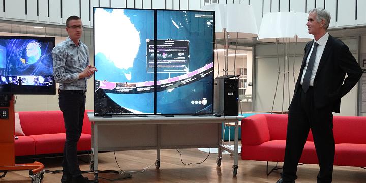 Gavin Winter (QUT), left, and Richard Simpson (SIBA) with a demonstration version of The Cube Globe technology